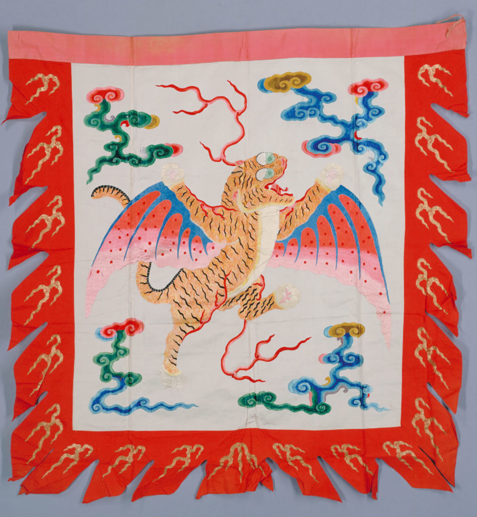 Flag of white silk embroidered with a colourful design of clouds and a winged tiger | Provided by the Palace Museum